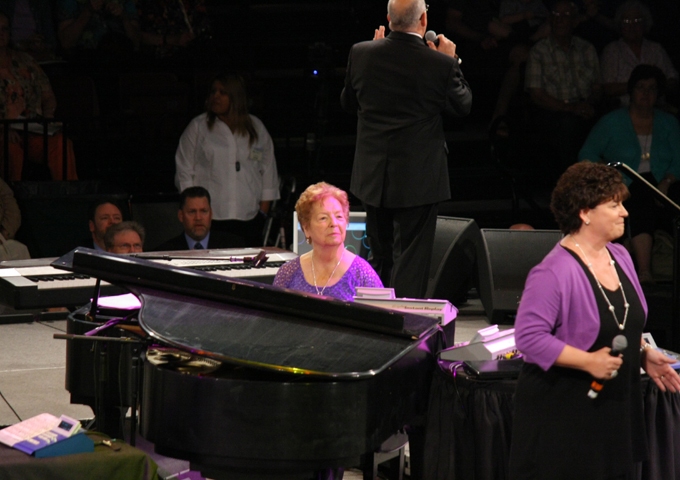 Charlotte at the keys. Who are those three guy's looking on?